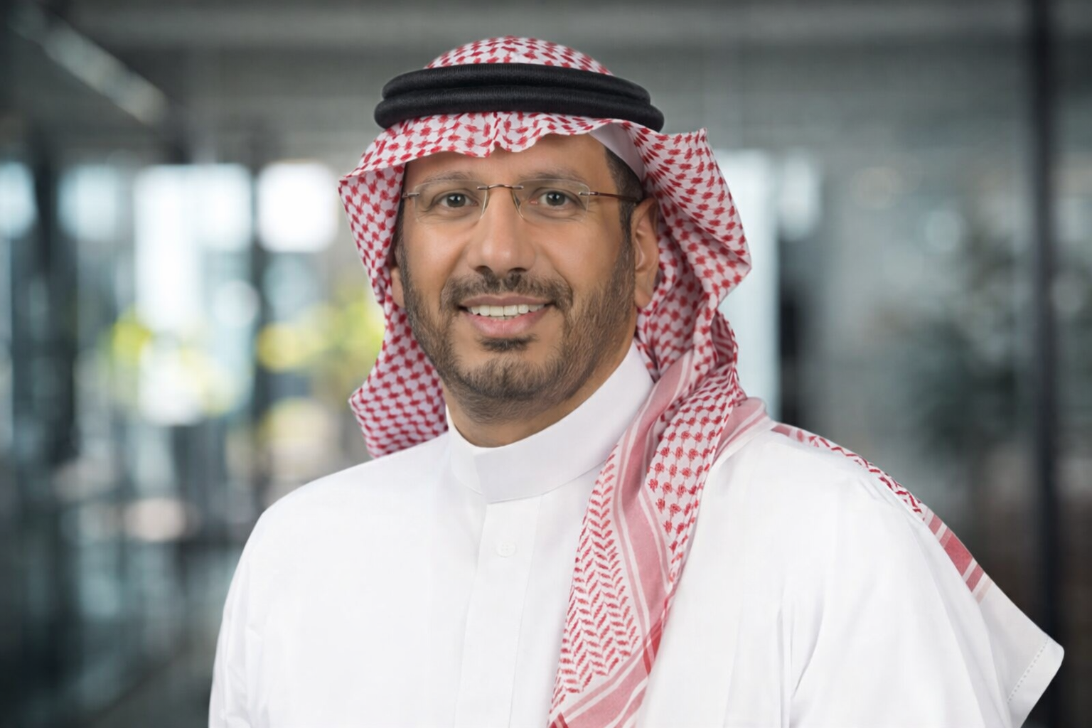 A team of surgeons performing an operation under surgical lights